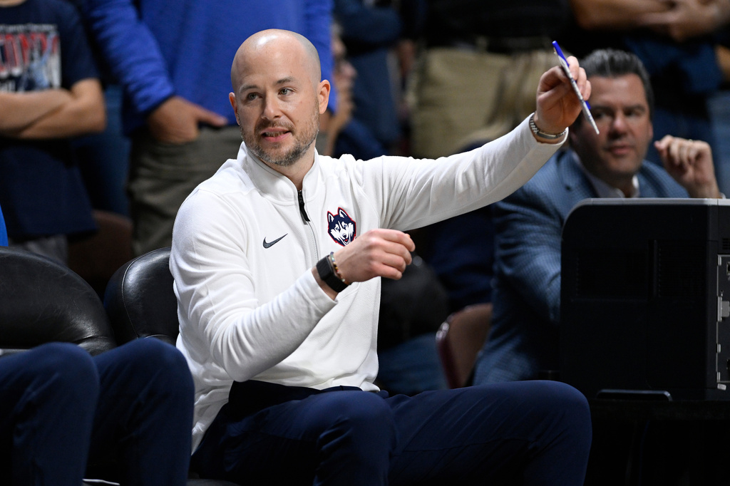 FILE - UConn assistant coach Luke Murray gestures during the first half of an exhibition NCAA basketball game against Boston College, Oct. 13, 2025, in Uncasville, Conn. (AP Photo/Jessica Hill, File)