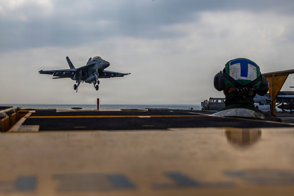 This photo provided by the U.S. Navy shows a Boeing F/A-18E Super Hornet landing on the Nimitz-class aircraft carrier USS Abraham Lincoln in the Indian Ocean on Jan. 22, 2026. (Mass Communication Specialist Seaman Daniel Kimmelman/U.S. Navy via AP)