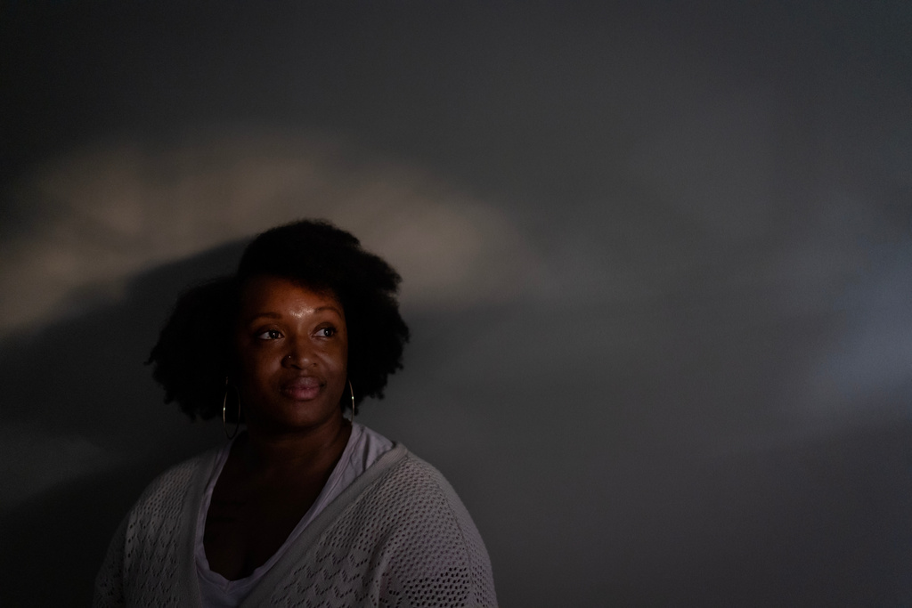 Kiara Alexander, who was hospitalized with autoimmune encephalitis, poses for a photo at her home, Friday, Oct. 10, 2025, in Charlotte, N.C. (AP Photo/David Goldman)