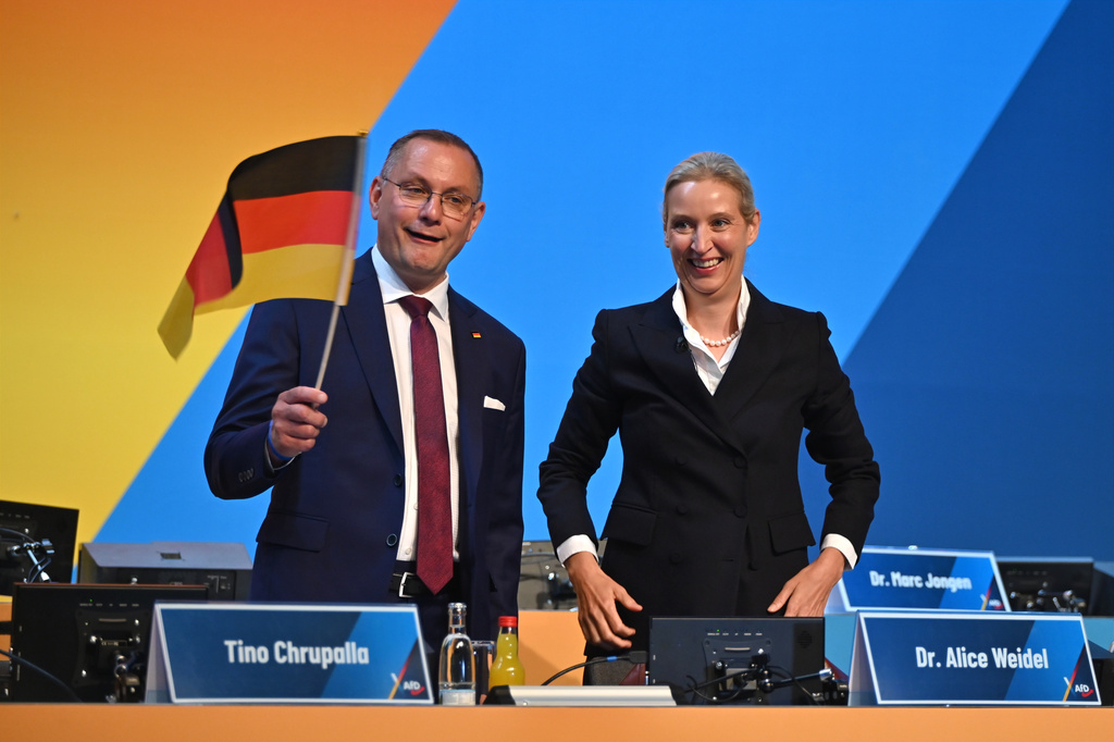 Alice Weidel, group leader of the AfD, right, and Tino Chrupalla, chairman of the AfD, attend the AfD party convention at the Erfurt Exhibition Center, Erfurt. Germany, Saturday July 4, 2026. (Katharina Kausche/dpa via AP)