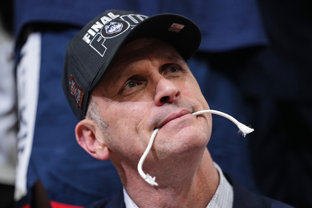 UConn head coach Dan Hurley celebrates after the team's win against Duke in the Elite Eight of the NCAA college basketball tournament, Sunday, March 29, 2026, in Washington. (AP Photo/Abbie Parr)