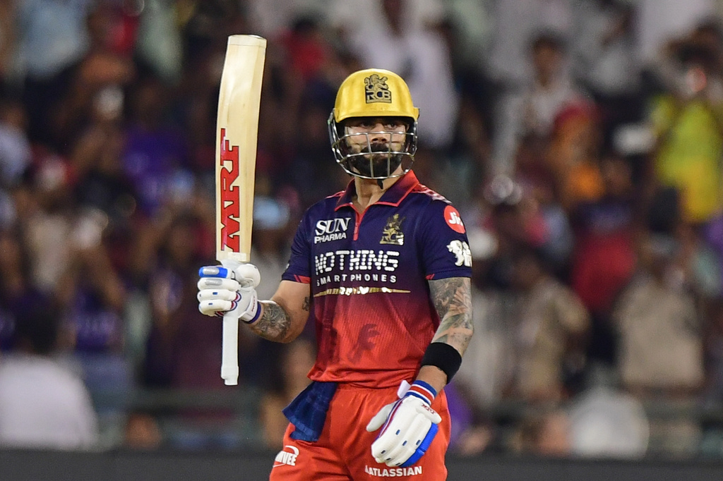 Royal Challengers Bengaluru's Virat Kohli celebrates his century during the Indian Premier League cricket match between Royal Challengers Bengaluru and Kolkata Knight Riders in Raipur, India, Wednesday, May 13, 2026. (AP Photo/Abhijit Addya)