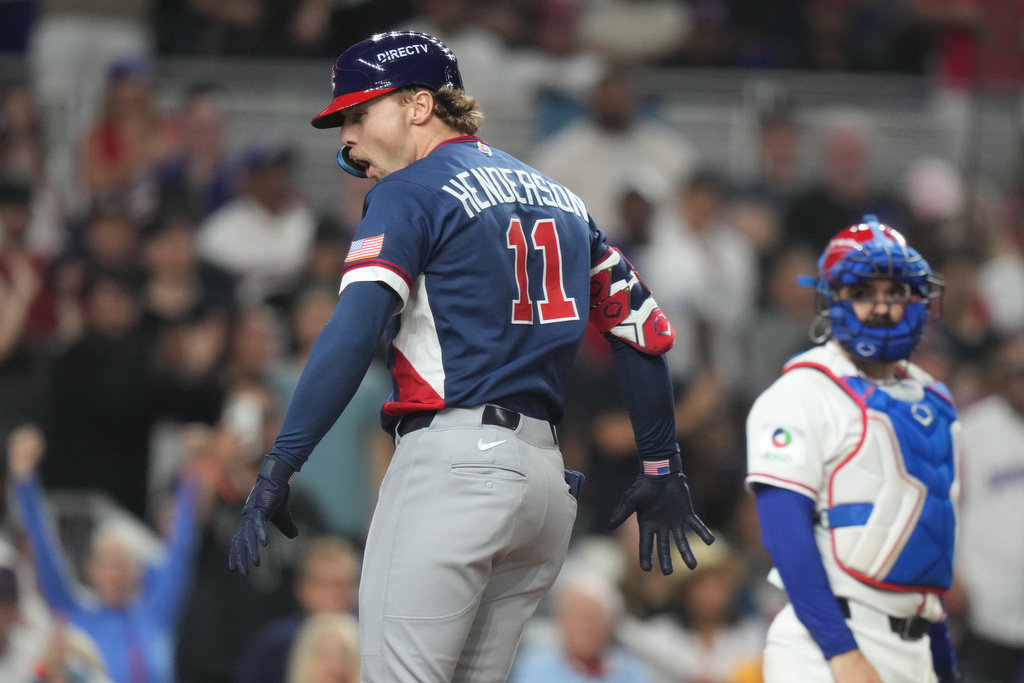 United States' Gunnar Henderson (11) celebrates after hitting a home run during the fourth inning of a World Baseball Classic semifinal game against the Dominican Republic, Sunday, March 15, 2026, in Miami. (AP Photo/Lynne Sladky)