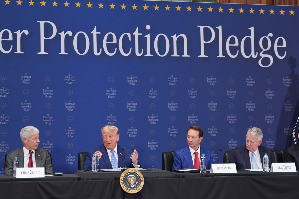 President Donald Trump speaks at the Environmental Protection Agency (EPA) Thursday, July 23, 2026, in Washington, as Energy Secretary Chris Wright, Louisiana Gov. Jeff Landry and Idaho Gov. Brad Little listen. (AP Photo/Alex Brandon)