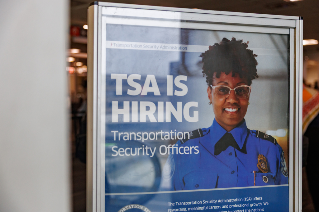 Signage reading "TSA is Hiring" at Philadelphia International Airport, Monday, March 23, 2026, in Philadelphia. (AP Photo/Hannah Beier)