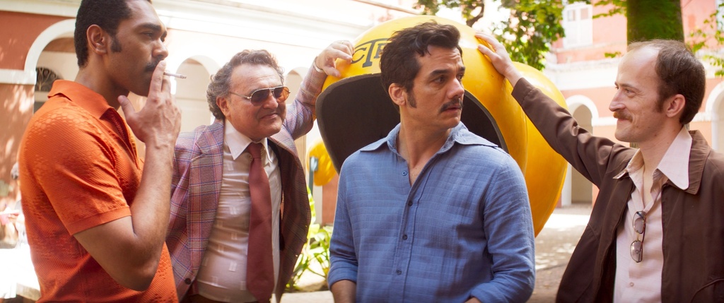 This image released by Neon shows, from left, Ítalo Martins, Robério Diógenes, Wagner Moura and Igor de Araújo in a scene from "The Secret Agent." (Neon via AP)