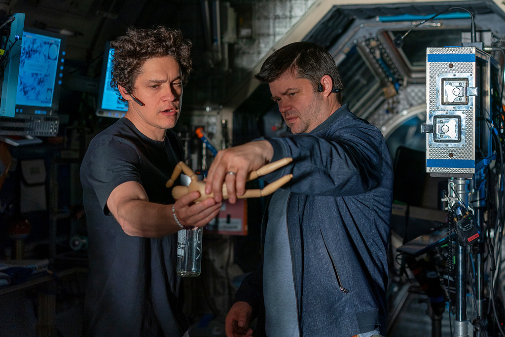 This image released by Amazon MGM Studios shows directors Phil Lord, left, and Christopher Miller on the set of "Project Hail Mary." (Jonathan Olley/Amazon MGM Studios via AP)