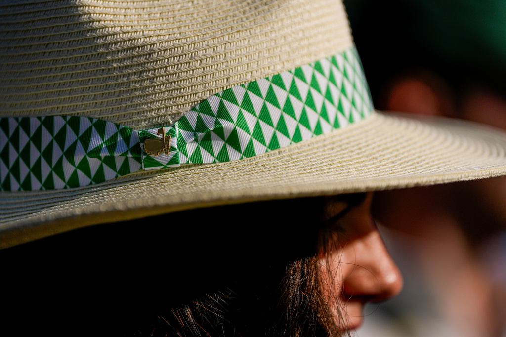 A patron watches during the second round of the Masters golf tournament at the Augusta National Golf Club, Friday, April 10, 2026, in Augusta, Ga. (AP Photo/Ashley Landis)