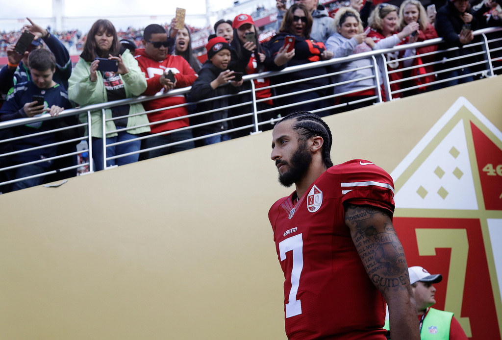 FILE - San Francisco 49ers quarterback Colin Kaepernick (7) walks out of a tunnel before an NFL football game against the Seattle Seahawks in Santa Clara, Calif., Sunday, Jan. 1, 2017. (AP Photo/Marcio Jose Sanchez, File)