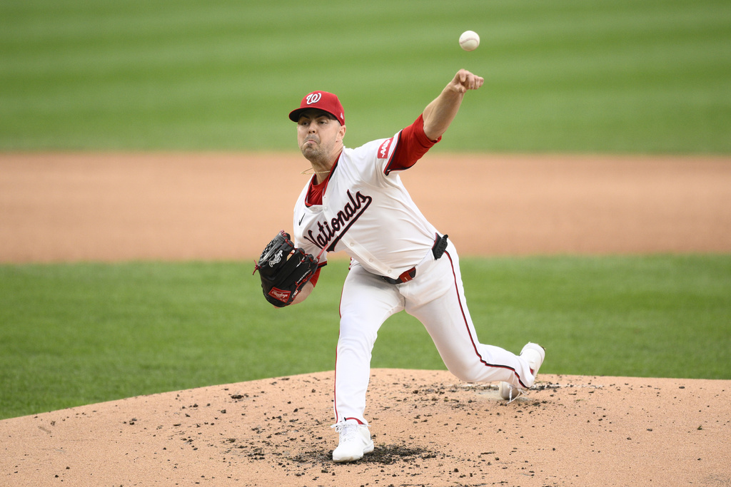 Washington Nationals starting pitcher MacKenzie Gore throws during the second inning of a baseball game against the New York Mets, Thursday, Aug. 21, 2025, in Washington. (AP Photo/Nick Wass)