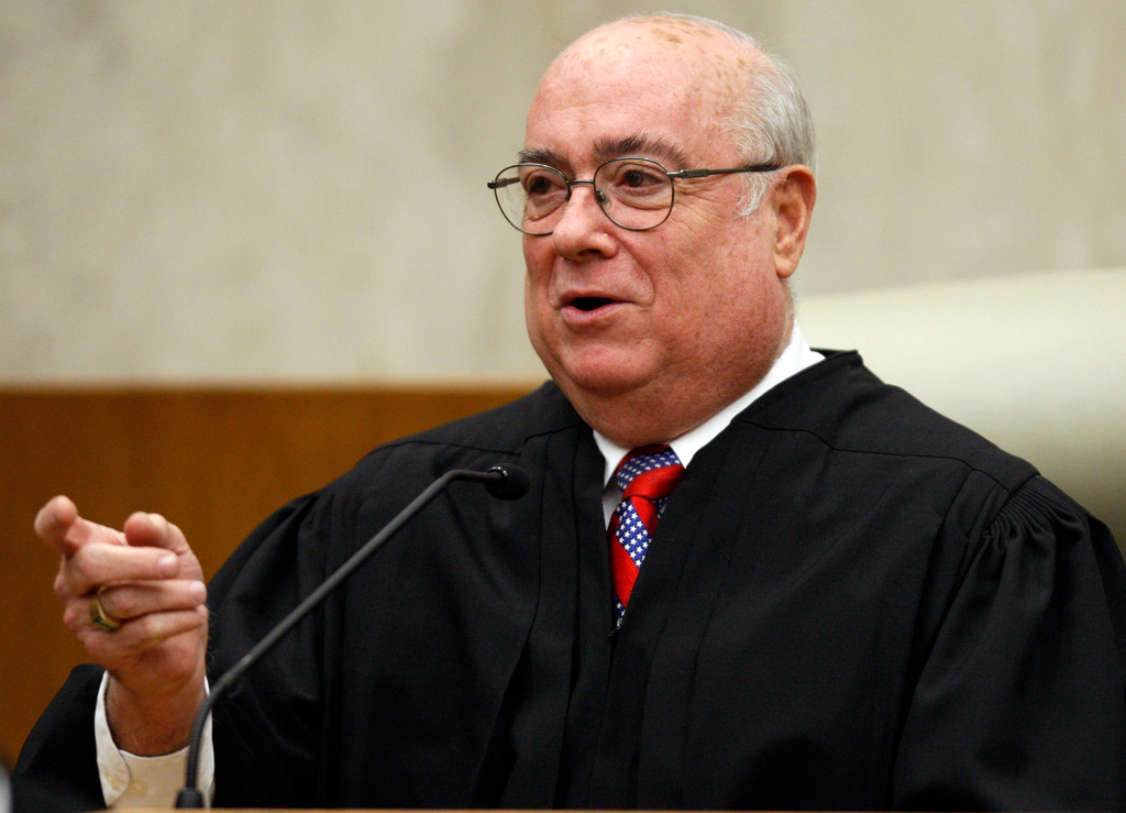 FILE - U.S. District Judge Royce C. Lamberth is seen during a ceremony at the federal courthouse in Washington on May 1, 2008. (AP Photo/Charles Dharapak, File)