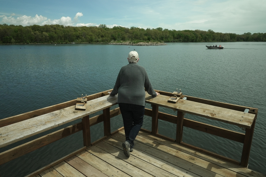 Mary Swander looks out over Lake Darling, Friday, May 8, 2026, in Brighton, Iowa. (AP Photo/Brittany Peterson)
