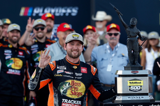 Chase Briscoe, center, celebrates with the trophy after winning a NASCAR Cup Series auto race at Talladega Superspeedway, Sunday, Oct. 19, 2025, in Talladega, Ala. (AP Photo/Butch Dill) Chase Briscoe, center, celebrates with the trophy after winning a NASCAR Cup Series auto race at Talladega Superspeedway, Sunday, Oct. 19, 2025, in Talladega, Ala. (AP Photo/Butch Dill)