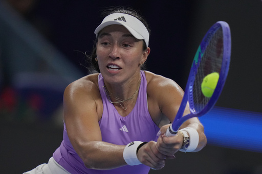 Jessica Pegula, of the United States returns a backhand shot from Linda Noskova, of the Czech Republic during the women's singles semifinals match of the China Open tennis tournament, at the National Tennis Center, in Beijing, Saturday, Oct. 4, 2025. (AP Photo/Andy Wong) Jessica Pegula, of the United States returns a backhand shot from Linda Noskova, of the Czech Republic during the women's singles semifinals match of the China Open tennis tournament, at the National Tennis Center, in Beijing, Saturday, Oct. 4, 2025. (AP Photo/Andy Wong)