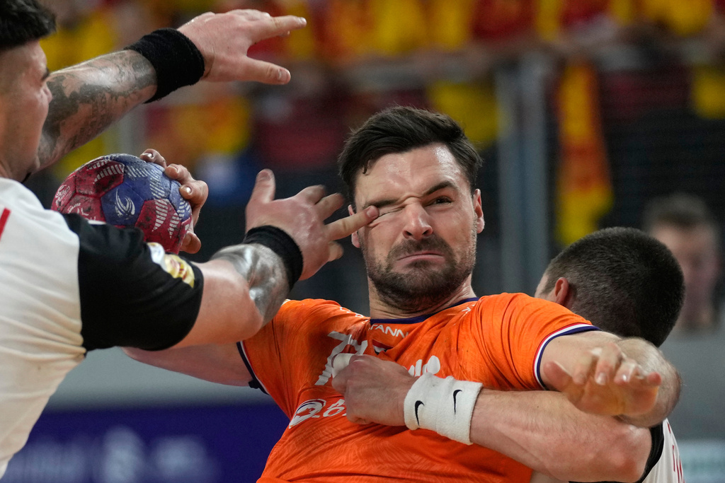 Dani Baijens, of the Netherlands, center, tries to score during the second round, group D, handball match between The Netherlands and North Macedonia at the Handball Men's World Championship in Varazdin, Croatia, Jan. 17, 2025. (AP Photo/Darko Bandic, File)