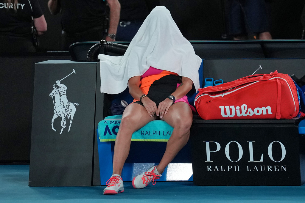 Aryna Sabalenka of Belarus reacts after losing to Elena Rybakina of Kazakhstan in the women's singles final at the Australian Open tennis championship in Melbourne, Australia, Saturday, Jan. 31, 2026. (AP Photo/Dita Alangkara)