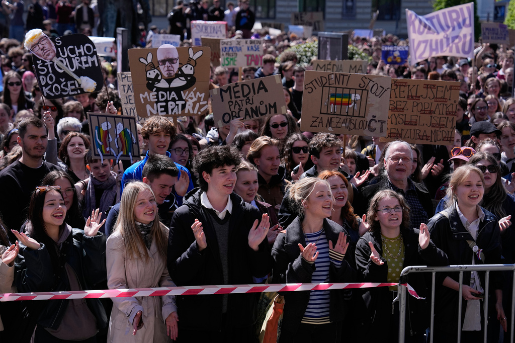 Thousands of students attend a demonstration in support of public media in Prague, Czech Republic, Wednesday, April 22, 2026. (AP Photo/Petr David Josek)
