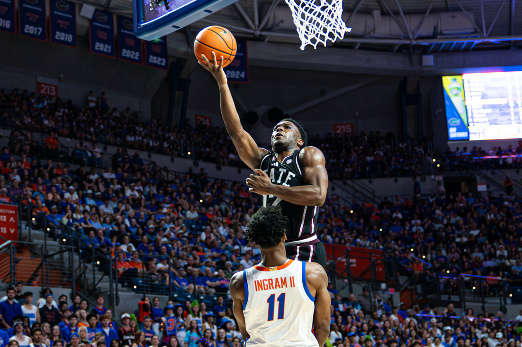 FILE - Mississippi State guard Josh Hubbard (12) goes for a layup against Florida during the second half of an NCAA college basketball game Tuesday, March 3, 2026, in Gainesville, Fla. (AP Photo/Morgan Hurd, file)