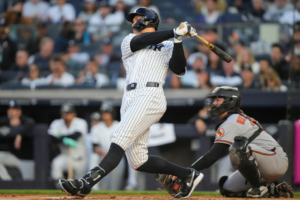 New York Yankees' Aaron Judge hits a two-run home run during the first inning of a baseball game against Baltimore Orioles, Monday, May 4, 2026, in New York. (AP Photo/Yuki Iwamura)