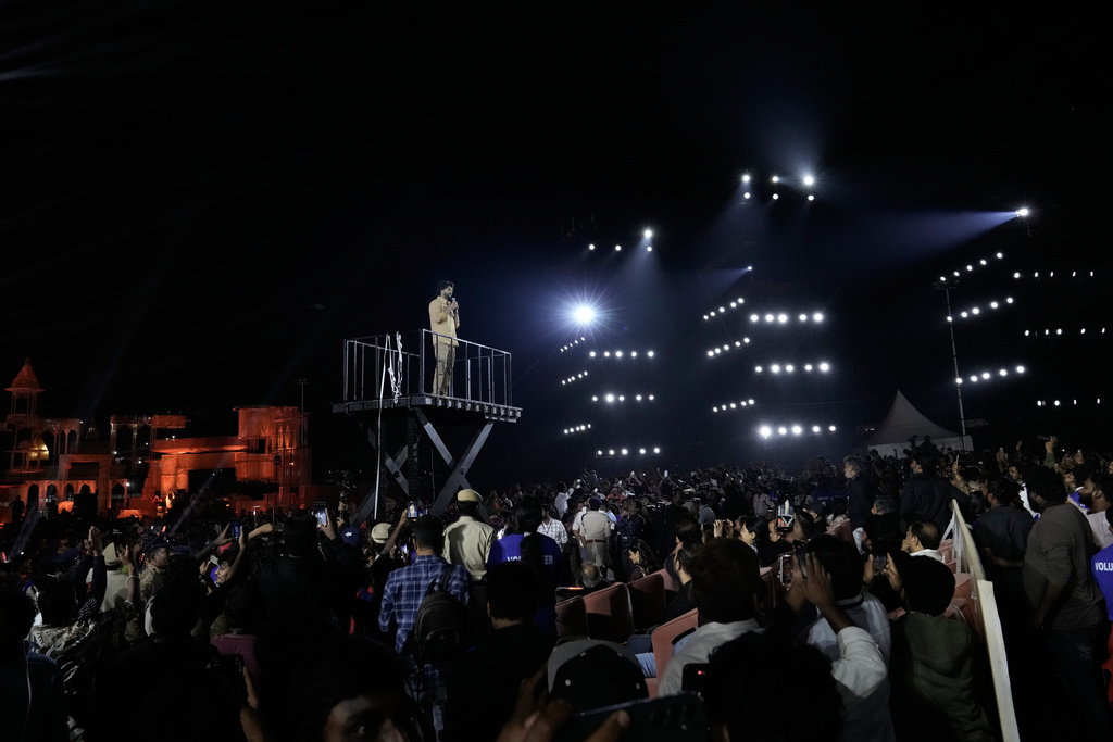 Tollywood superstar Mahesh Babu addresses his fans after unveiling the first look of the film "Varanasi" in Hyderabad, India, Saturday, Nov. 15, 2025. (AP Photo/Mahesh Kumar A.)