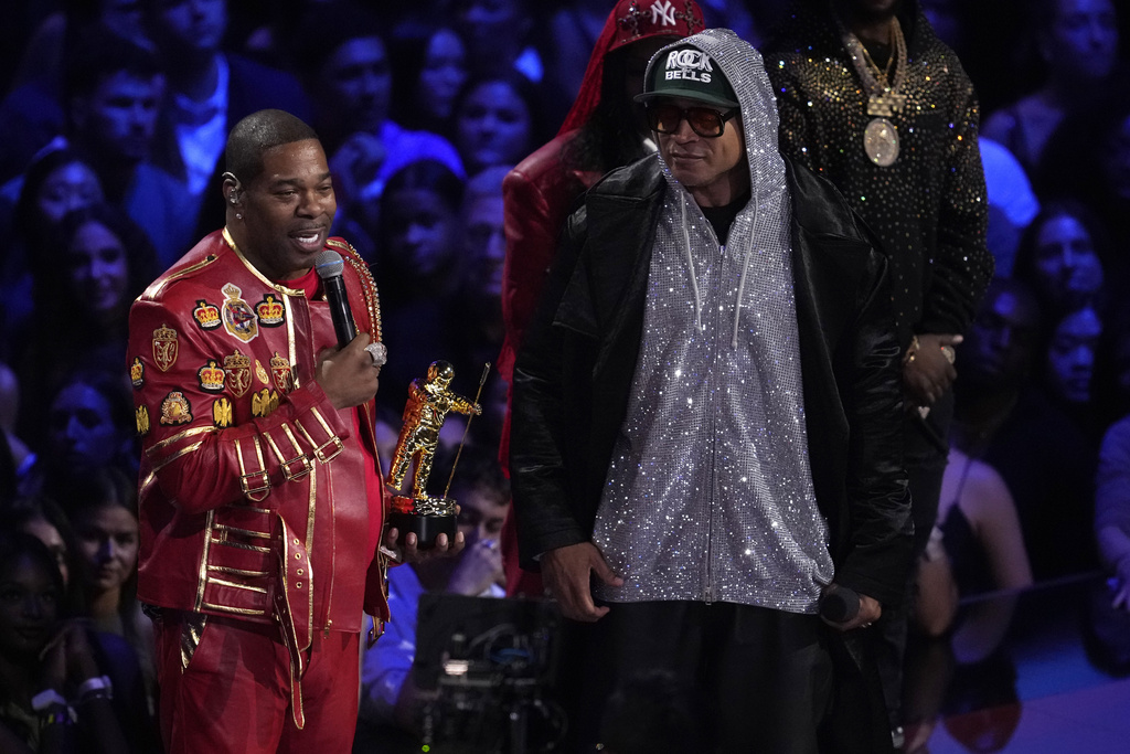 LL Cool J, right, presents the rock the bells visionary award to Busta Rhymes, left, during the MTV Video Music Awards on Sunday, Sept. 7, 2025, at UBS Arena in Elmont, N.Y. (Photo by Charles Sykes/Invision/AP)