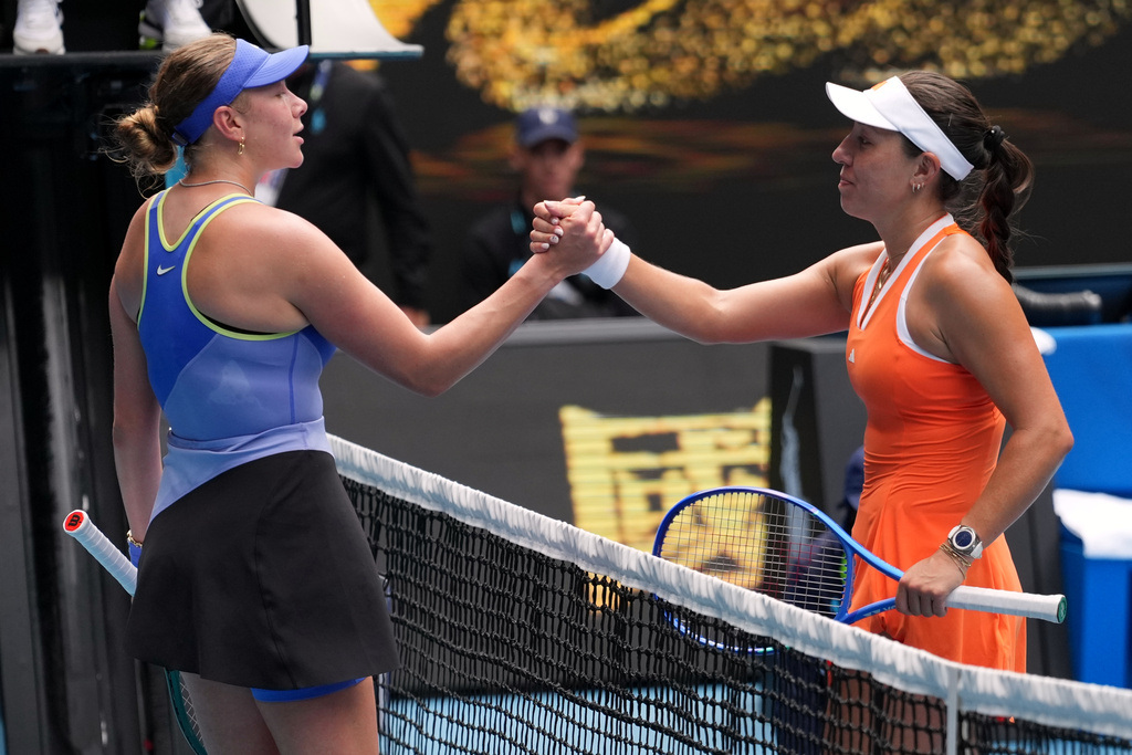 Jessica Pegula, right, of the U.S. is congratulated by compatriot Amanda Anisimova, left, during their quarterfinal match at the Australian Open tennis championship in Melbourne, Australia, Wednesday, Jan. 28, 2026. (AP Photo/Dar Yasin)