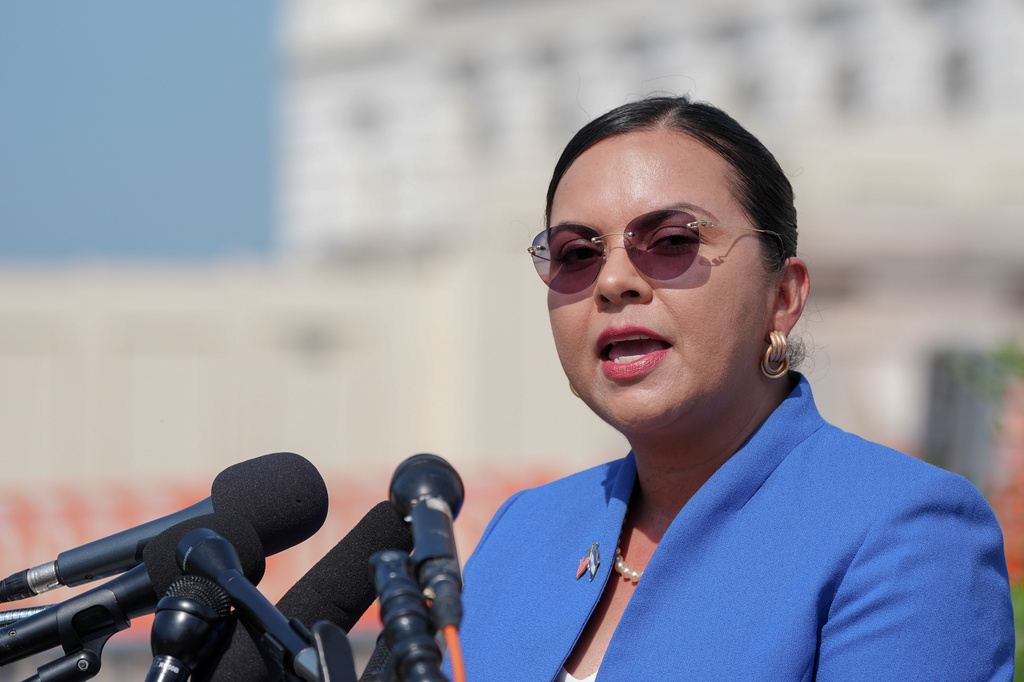 Maria Teresa McPha speaks during a news conference on the Temporary Protected Status of Salvadorans on Capitol Hill, Wednesday, Sept. 2, 2026, in Washington. (AP Photo/Mariam Zuhaib)