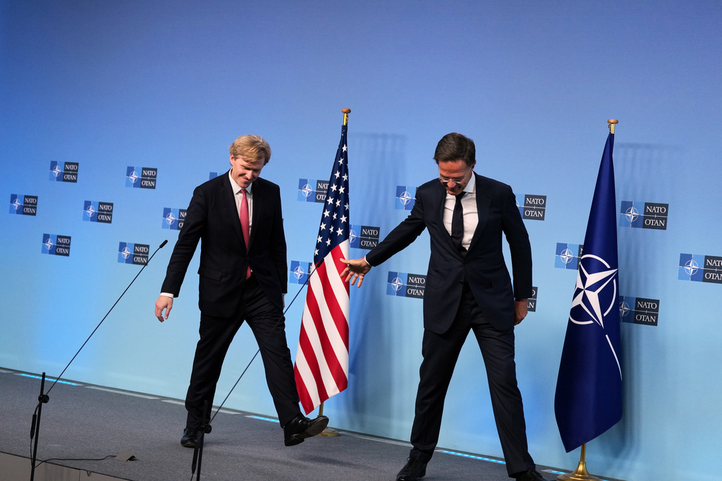 NATO Secretary General Mark Rutte, right, and United States Undersecretary of Defense Elbridge Colby leave the podium after addressing the media at NATO headquarters in Brussels, Thursday, Aug. 27, 2026. (AP Photo/Virginia Mayo)