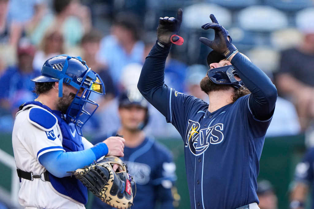 Tampa Bay Rays' Ryan Vilade celebrates as he crosses the plate after hitting a solo home run during the third inning of a baseball game against the Kansas City Royals, Tuesday, June 30, 2026, in Kansas City, Mo. (AP Photo/Charlie Riedel)
