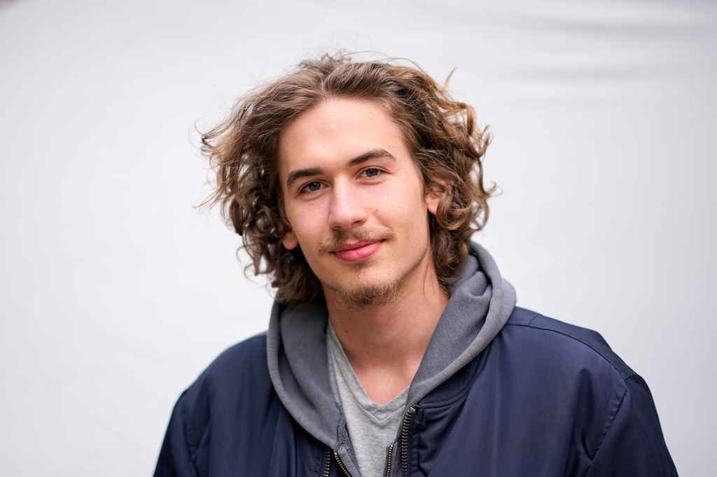 Vincent Nelson, 20, poses for a portrait in Budapest, Hungary, Monday, April 13, 2026. "We didn't like what we were seeing and had to do something about it." (AP Photo/Petr David Josek)