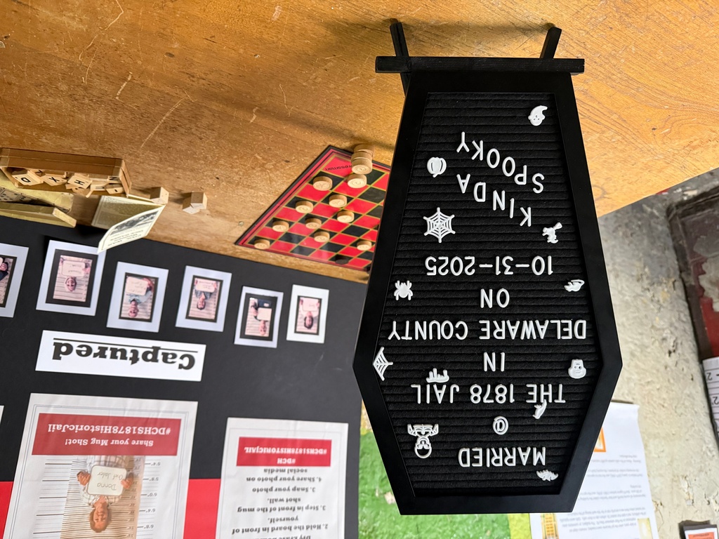 /// A sign made for couples who were getting married at the Historic Jail and Sheriff's Residence on Friday, Oct. 31, 2025, in Delaware, Ohio. (AP Photo/Patrick Aftoora-Orsagos)