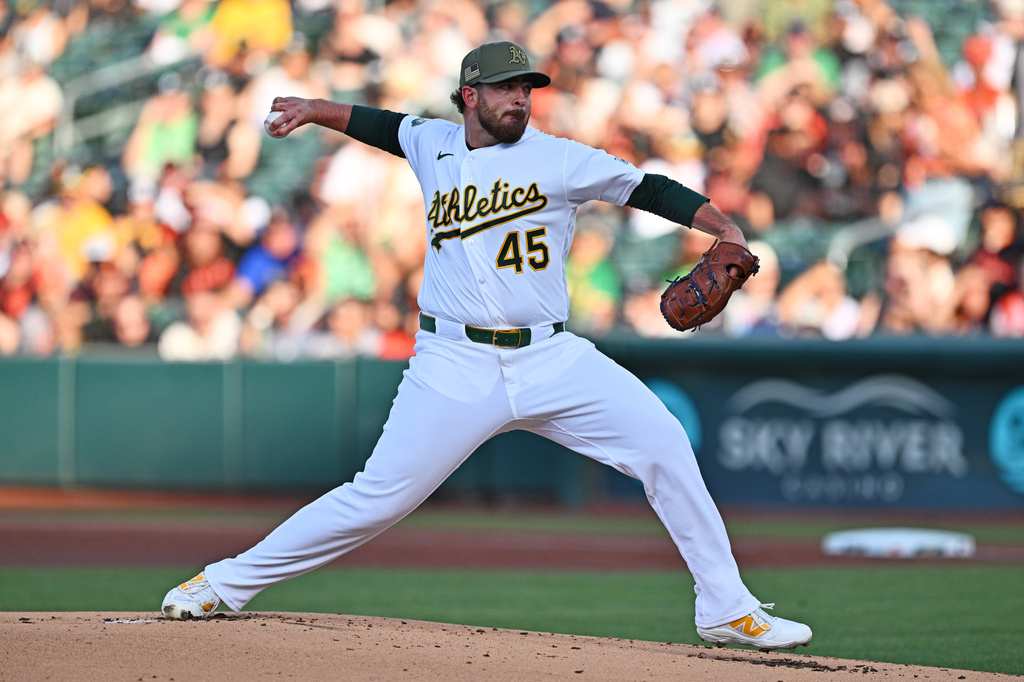 Athletics pitcher Aaron Civale throws against the San Francisco Giants in the first inning of a baseball game in West Sacramento, Calif., Friday, May 15, 2026. (Jose Carlos Fajardo/Bay Area News Group via AP)