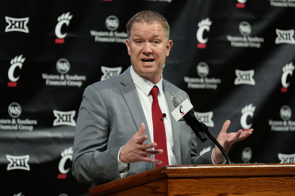 FILE - Cincinnati's new men's basketball coach Jerrod Calhoun speaks during his introductory news conference in Cincinnati, Ohio, March 25, 2026. (AP Photo/Carolyn Kaster, File)