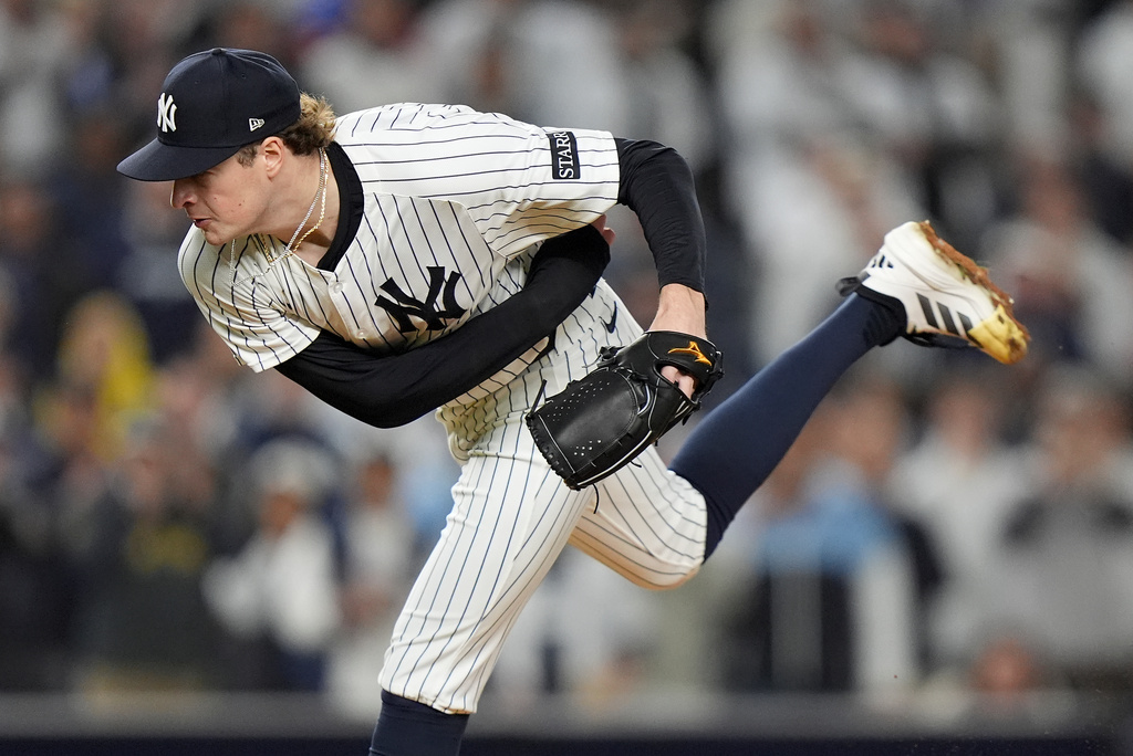 New York Yankees pitcher Cam Schlittler delivers against the Boston Red Sox during the seventh inning of Game 3 of an American League wild-card baseball playoff series, Thursday, Oct. 2, 2025, in New York. (AP Photo/Frank Franklin II)