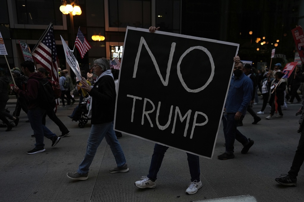 People march during Illinois Coalition for Immigrant & Refugee Rights' "Chicago Says No Trump No Troops" protest Saturday, Sept. 6, 2025, in Chicago. (AP Photo/Carolyn Kaster)