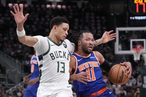 New York Knicks' Jalen Brunson tries to get past Milwaukee Bucks' Ryan Rollins during the first half of an NBA basketball game Tuesday, Oct. 28, 2025, in Milwaukee. (AP Photo/Morry Gash) New York Knicks' Jalen Brunson tries to get past Milwaukee Bucks' Ryan Rollins during the first half of an NBA basketball game Tuesday, Oct. 28, 2025, in Milwaukee. (AP Photo/Morry Gash)