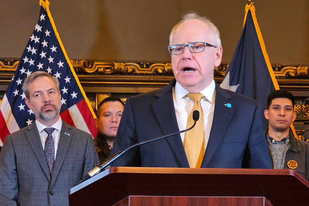 Gov. Tim Walz holds a news conference at the State Capitol in St. Paul, Minn., on Thursday, Feb. 12, 2026. (AP Photo/Steve Karnowski)