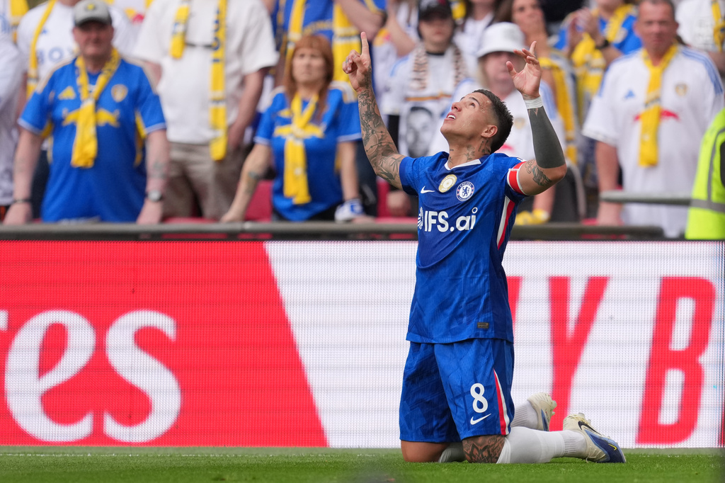 Chelsea's Enzo Fernandez celebrates after scoring during the FA Cup semifinal soccer match between Chelsea and Leeds in London, England, Sunday, April 26, 2026. (AP Photo/Kin Cheung)
