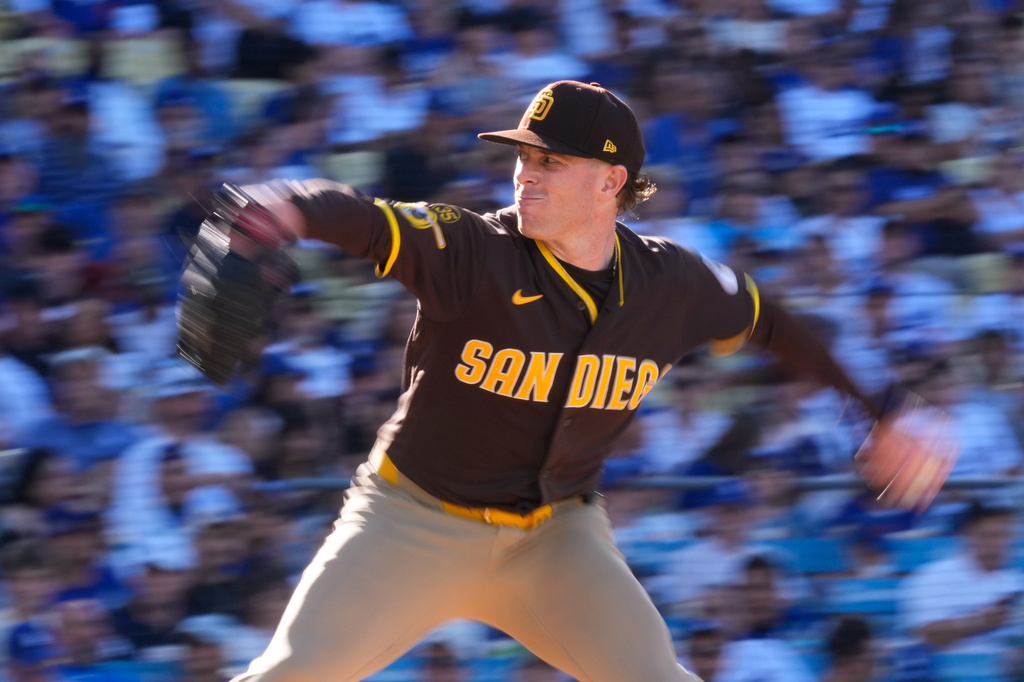 San Diego Padres starting pitcher Jp Sears throws to the plate during the fifth inning of a baseball game against the Los Angeles Dodgers,Sunday, July 5, 2026, in Los Angeles. (AP Photo/Mark J. Terrill)