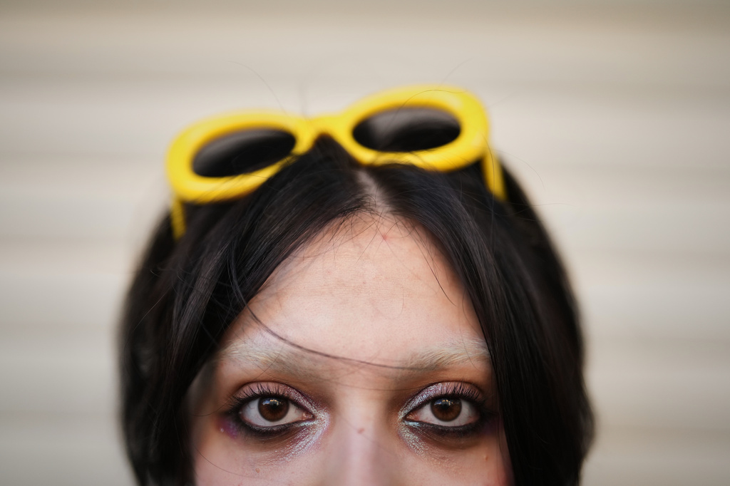 Armita, no surname given, poses for a photo in central Tehran, Iran, Wednesday, April 8, 2026. (AP Photo/Francisco Seco)