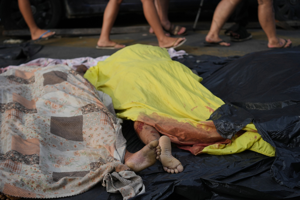 The bodies of a men killed the day before during a police raid targeting the Comando Vermelho gang lie in the Complexo da Penha favela of Rio de Janeiro, Brazil, Wednesday, Oct. 29, 2025. (AP Photo/Silvia Izquierdo) (AP Photo/Silvia Izquierdo)