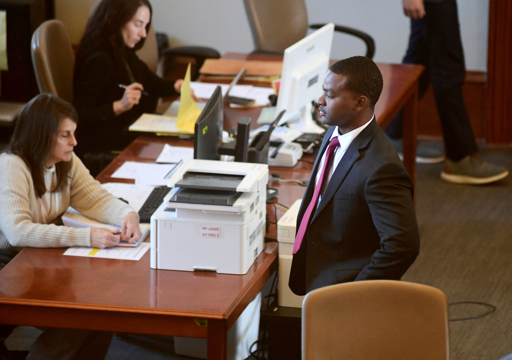 FILE - Sheldon Timothy Herrington Jr., who is on trial on a capital murder charge in the 2022 death of University of Mississippi student Jimmie "Jay" Lee, looks out into the courtroom during the lunch break, in Oxford, Miss., on Dec. 3, 2024. (Bruce Newman/The Northeast Mississippi Daily Journal via AP, Pool, File)