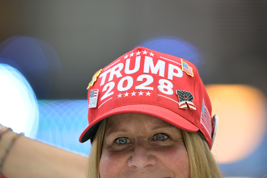 A guest attends the Rededicate 250: A National Jubilee Of Prayer, Praise & Thanksgiving, Sunday, May 17, 2026, in Washington. (AP Photo/Rod Lamkey, Jr.)