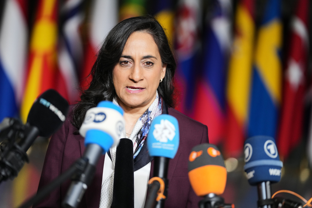 FILE - Canada's Foreign Minister Anita Anand speaks with the media as she arrives for a meeting of NATO foreign ministers at NATO headquarters, in Brussels, Dec. 3, 2025. (AP Photo/Virginia Mayo, File)