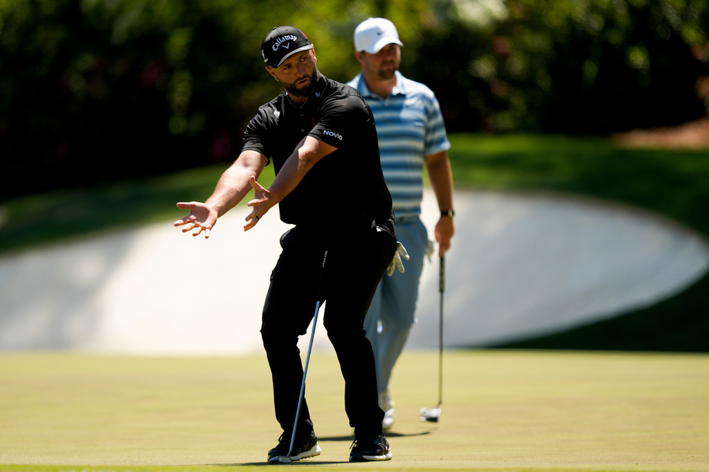 Jon Rahm, of Spain, reacts after missing a putt on the 13th hole during the second round of the Masters golf tournament at the Augusta National Golf Club, Friday, April 10, 2026, in Augusta, Ga. (AP Photo/Matt Slocum)