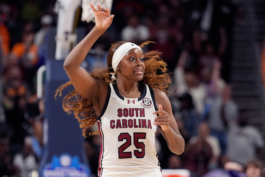 South Carolina guard Raven Johnson celebrates after scoring against LSU during the second half of an NCAA college basketball game in the semifinals of the Southeastern Conference tournament, Saturday, March 7, 2026, in Greenville, S.C. (AP Photo/Chris Carlson)
