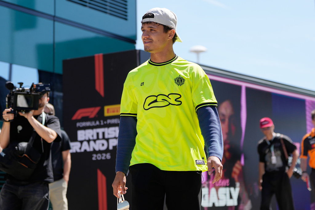 McLaren driver Lando Norris of Britain arrives to the paddock at the Silverstone racetrack ahead of the British F1 Grand Prix, in Silverstone, England, Thursday, July 2, 2026. (AP Photo/Darko Bandic)