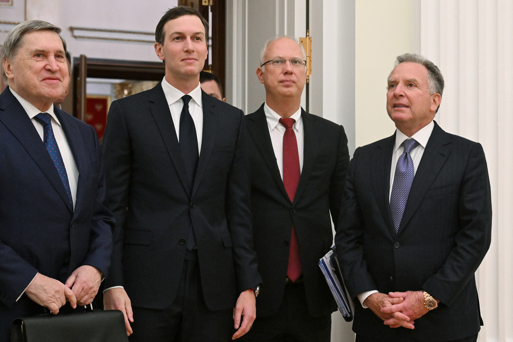 FILE - U.S. special envoy Steve Witkoff, right, Russian presidential foreign policy adviser Yuri Ushakov, left, Russian Direct Investment Fund CEO Kirill Dmitriev, second right, and Jared Kushner, U.S. President Donald Trump’s son-in-law, arrive for meetings in Moscow, on Dec. 2, 2025. (Kristina Kormilitsyna, Sputnik, Kremlin Pool Photo via AP, File)