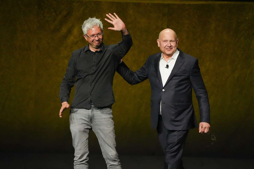 FILE - Pierre Coffin, left, director of "Minions & Monsters," and Chris Meledandri, CEO of Illumination, appear during the Universal Pictures and Focus Features presentation at CinemaCon in Las Vegas on April 15, 2026. (AP Photo/Chris Pizzello, File)