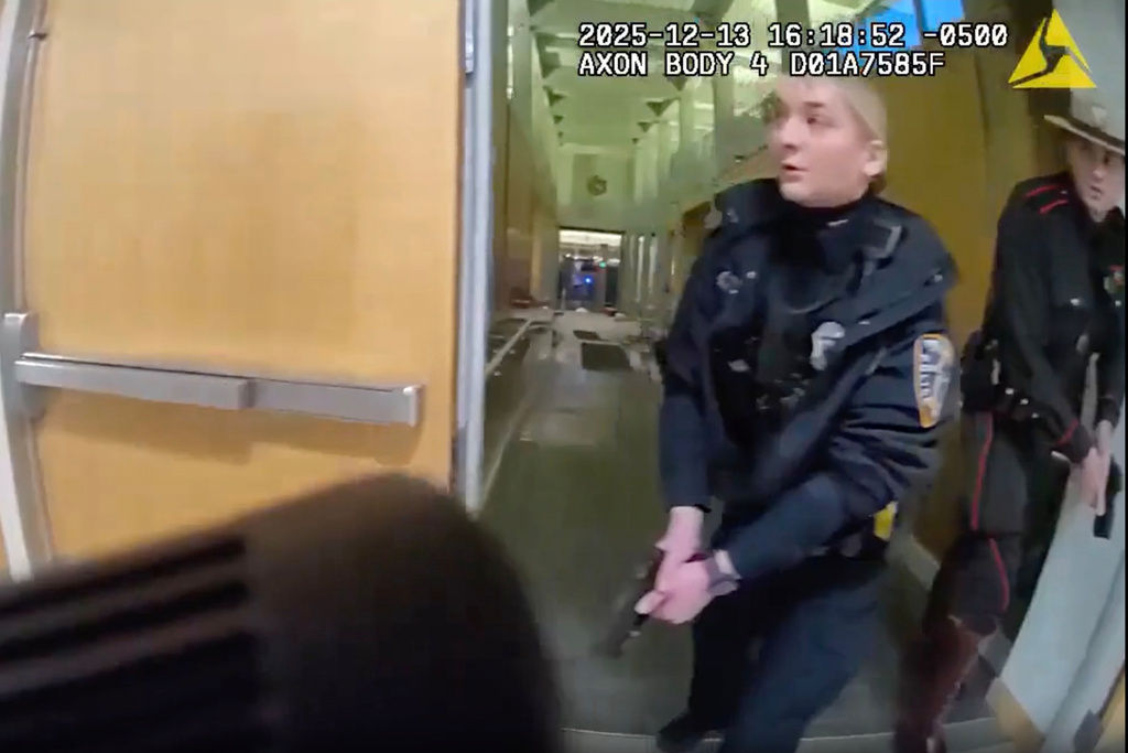 This image from police body cam video provided by Providence Police shows police responding at the scene of a shooting at Brown University in Providence, R.I., Dec. 13, 2025. (Providence Police via AP)
